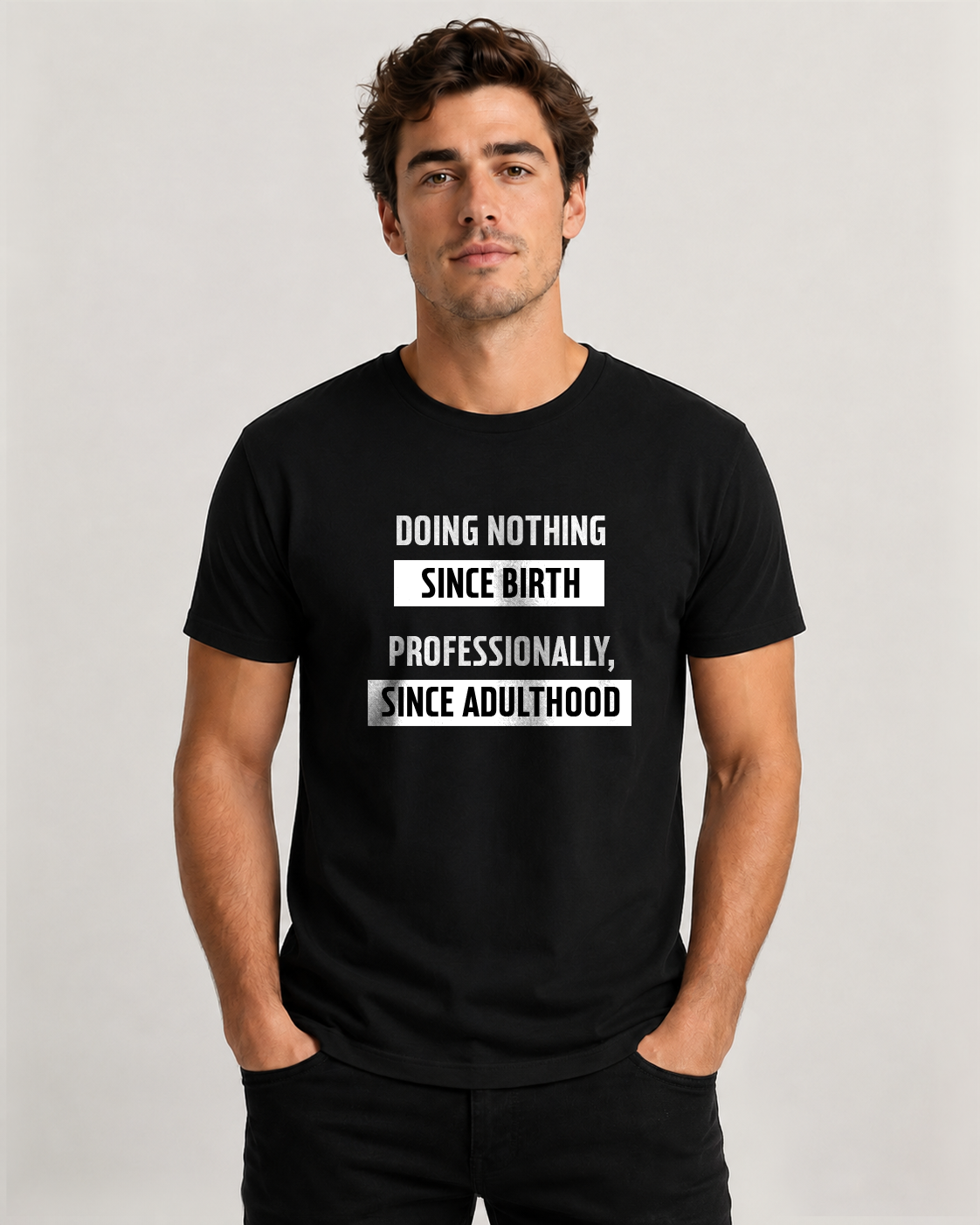 Black men's t-shirt with quote "Doing nothing since birth. Professionally, since…" – Underperform, size XS