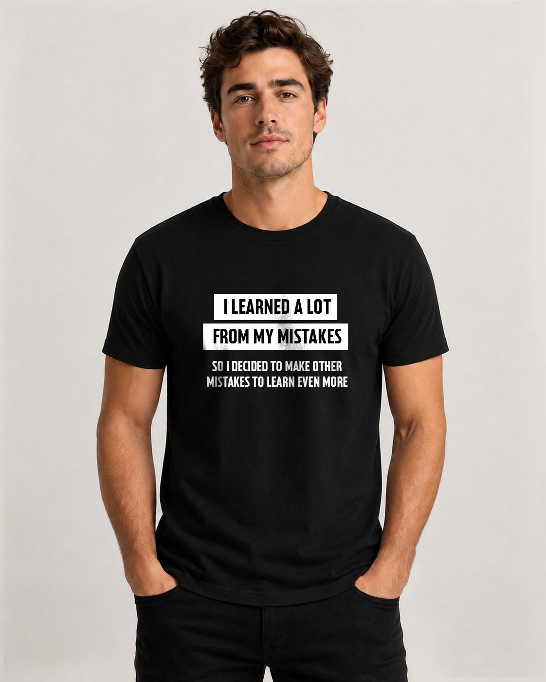 Black men's t-shirt with quote "I learned a lot from my…" – Underperform, size XS