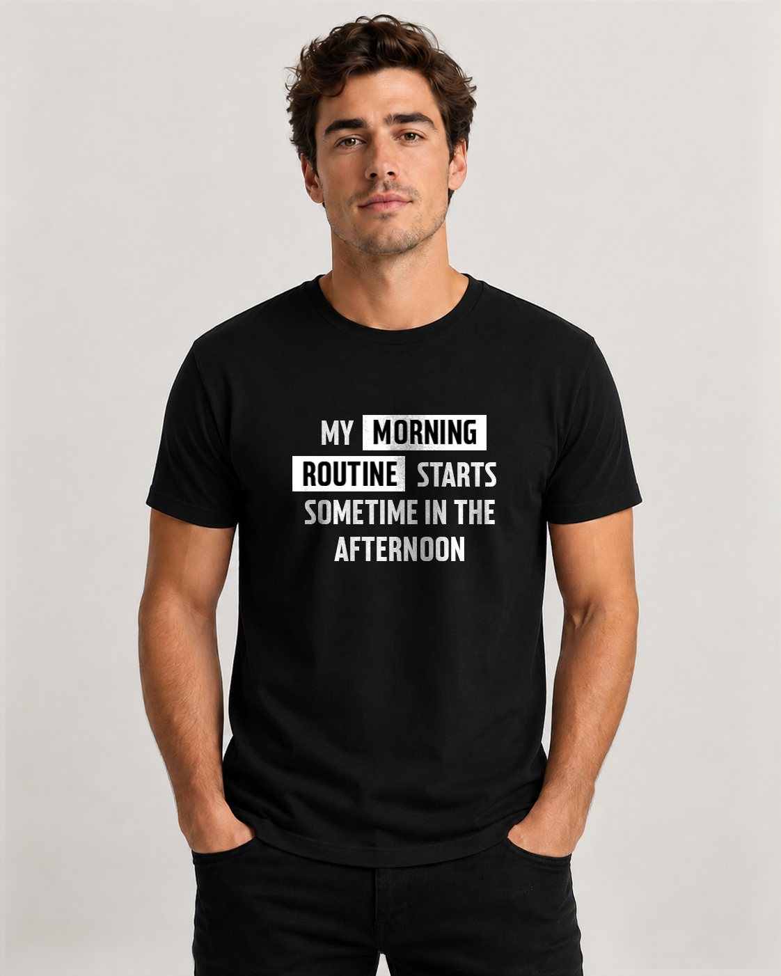 Black men's t-shirt with quote "My morning routine starts sometime in…" – Underperform, size XS